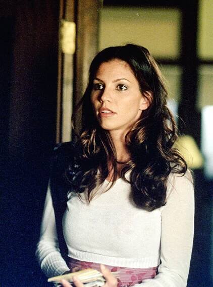 Image may contain Charisma Carpenter Clothing Apparel Sleeve Human Person Long Sleeve and Face