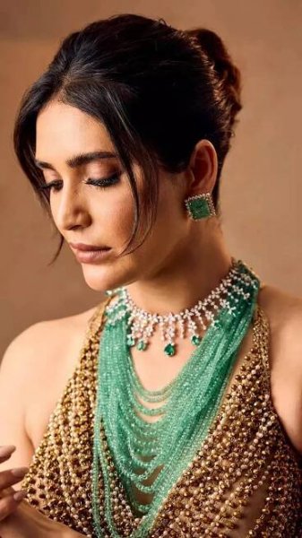 Karishma Tanna’s glamorous saree look is a bold fusion of royalty and modern edge
