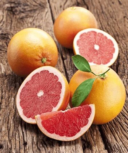 Grapefruity s plátky. — Stock obrázek