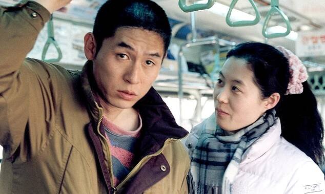 Sol Kyung-gu and Moon So-ri in "Oasis"