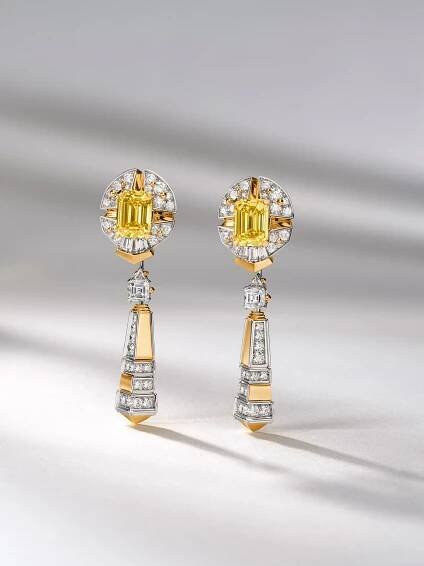 Sagesse rayonnante earrings, detachable pendants, yellow gold, white gold, emerald-cut Fancy Vivid Yellow diamonds of 3.13 and 3.03 carats, diamonds. Pierres de Caractère collection, Van Cleef & Arpels.