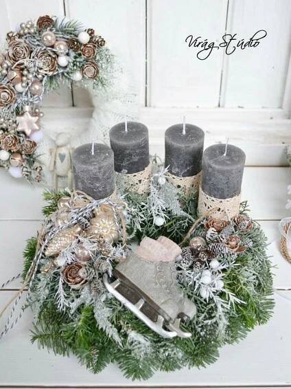 a wreath with candles and decorations on it