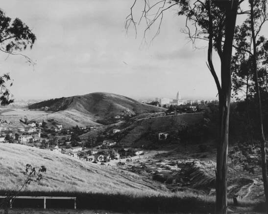 1952: "A panoramic view of Chavez Ravine, showing the residential community. The Los Angeles Civic Center is visible in the background." Courtesy of the Los Angeles Public Library