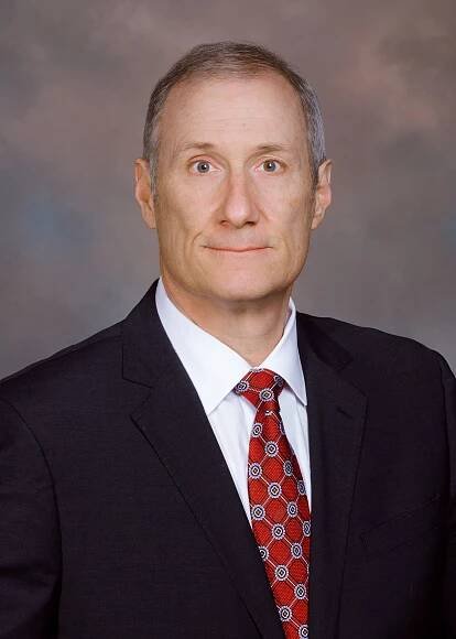 Laurence M. Dickinson » Midkiff, Muncie & Ross