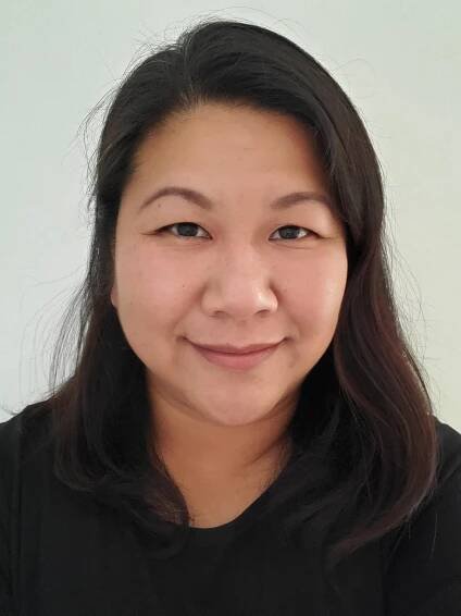 Carol Cheng, medium-length brown hair with black top