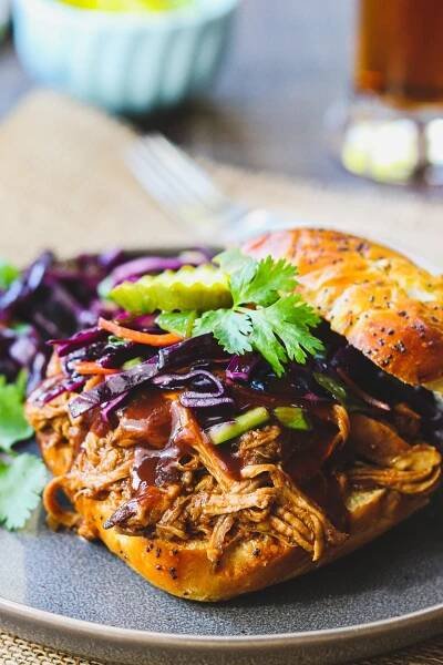 Pulled pork tenderloin piled high on a toasted bun and topped with Asian red cabbage slaw.