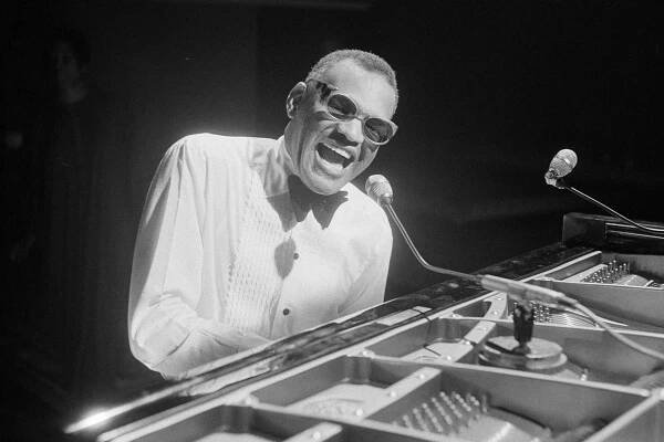 American singer Ray Charles (1930 - 2004) performs in a still from the CBS special 'Barbra Streisand and Other Musical Instruments,' London, England, August 8, 1973. (Photo by CBS Photo Archive/Getty Images)