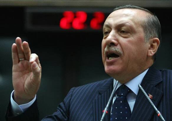 Turkish prime minister tells Syria’s president to step down or risk tragic end