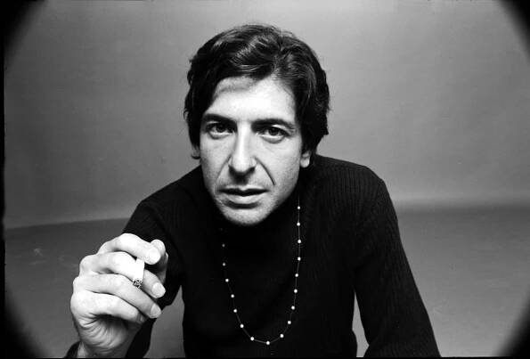 Portrait of Canadian poet, novelist, and musician Leonard Cohen (1934 - 2016), dressed in black, as he holds a cigarette in one hand, August 1967. (Photo by Jack Robinson/Getty Images)