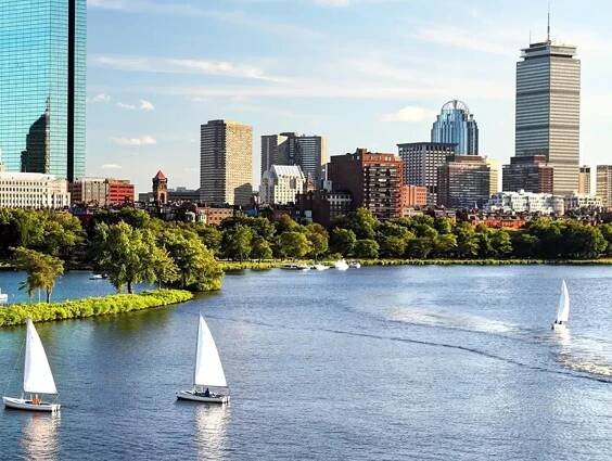 View of downtown Boston from the Charles River. The Prudential Center is in background.