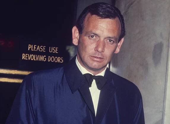 David Janssen in tux and overcoat; circa 1960; New York