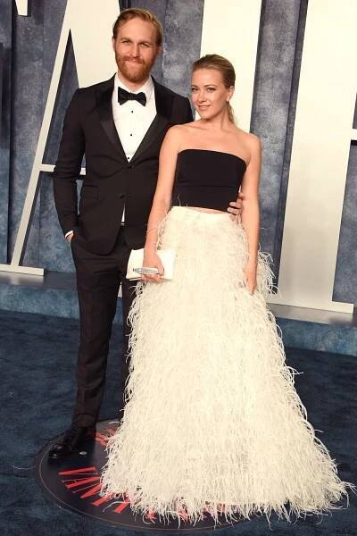 Meredith Hagner and Wyatt Russell at the Vanity Fair Oscar Party on March 12, 2023, in Beverly Hills, Calif.