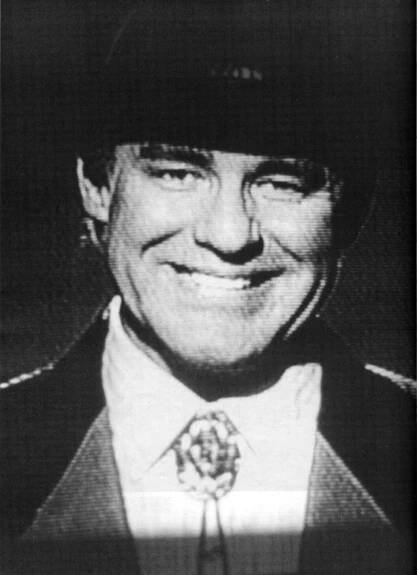 Phil Hartman photographed live from the television screen by the author.