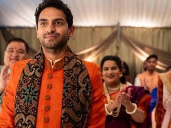 Harish Patel, Karan Soni (in front), Zarna Garg and Sunita Mani in a scene from Roshan Sethi’s queer rom-com, ‘A Nice Indian Boy’. All are dressed in Indian festive wear (Image courtesy: Levantine Films)