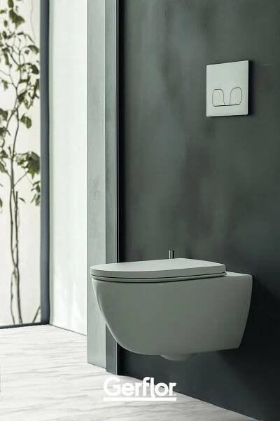 toilettes modernes vert sauge avec wc suspendu et mur texturé en 2025 | Toilette design, Idée déco wc, Toilettes modernes
