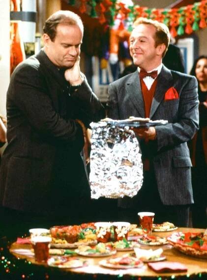 FRASIER -- "The Fight Before Christmas" Kelsey Grammer as Frasier Crane, Edward Hibbert as Gil Chesterton --