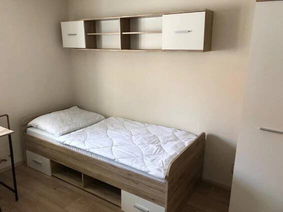 Postel nebo postele na pokoji v ubytování Ubytování RD Oskol