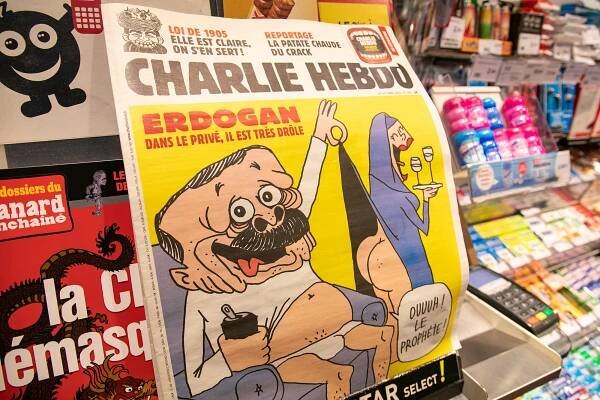 French satirical weekly Charlie Hebdo's edition displaying a cover with a satirical drawing representing Turkish President Tayyip Erdogan