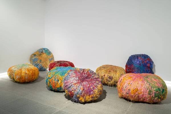 colorful textured sculptures that serve as seating or art pieces