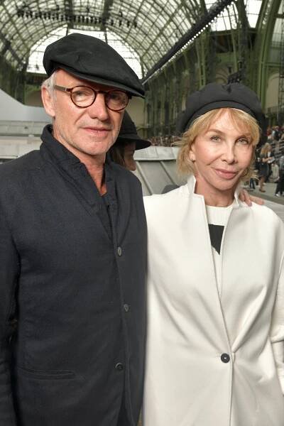 Sting and Trudie Styler in the front row (Photo by Swan Gallet/WWD/Penske Media via Getty Images)