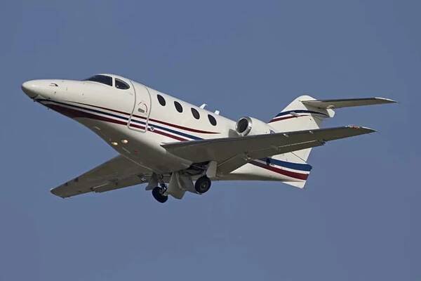 Premier I private jet charter'