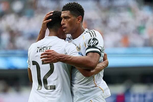 Jude Bellingham of Real Madrid CF (L) and Trent Alexander-Arnold of Real Madrid CF (R) embrace during the FIFA Club World Cup 2025 group H match between Real Madrid CF and CF Pachuca at Bank of America Stadium on June 22, 2025 in Charlotte, North Carolina.