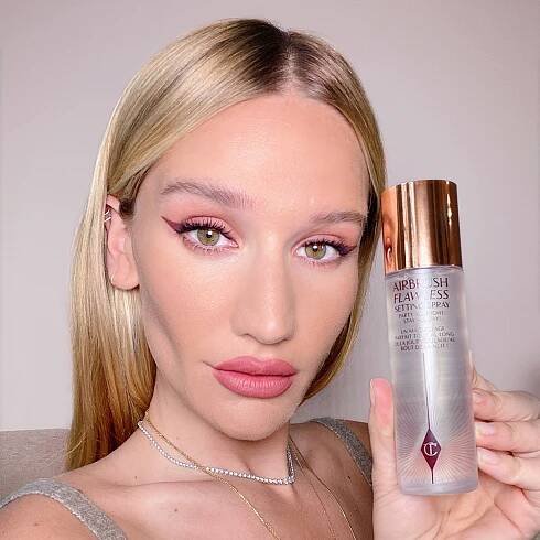 Sofia Tilbury holds 100ml setting spray