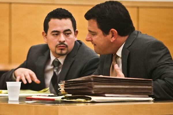 Diego Ramos, left, is seen in court with his lawyer on Oct. 1, 2014.