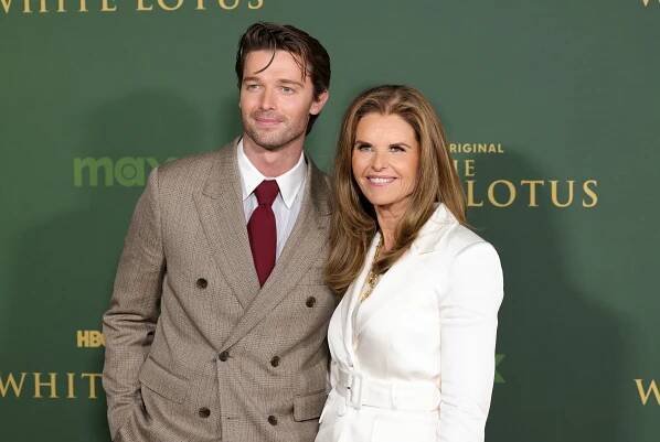Patrick Schwarzenegger and Maria Shriver at red carpet
