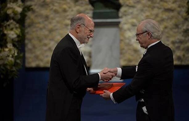 Michael Rosbash receiving his Nobel Prize from H.M. King Carl XVI Gustaf of Sweden