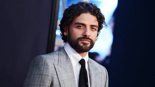 Oscar Isaac Elegant Suit Wallpaper