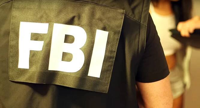 FBI Special Agent with Rescued Trafficking Victim
