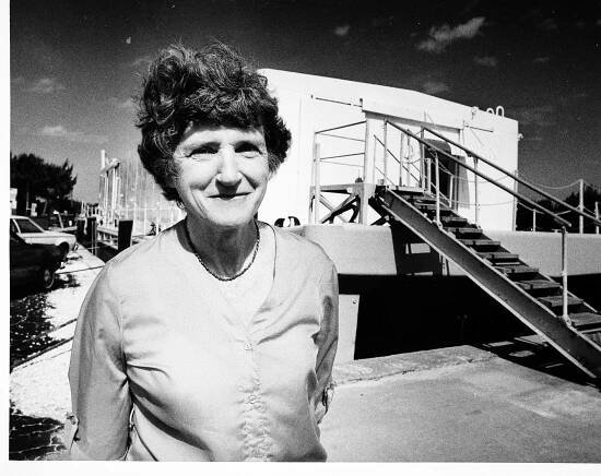 Portrait of Mary Rice in front of a trailer with stairs. 