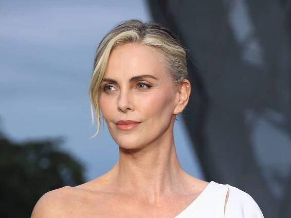 Charlize Theron stuns with sultry transformation as she recreates Michelle Pfeiffer's most iconic look