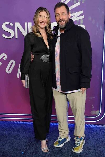 NEW YORK, NEW YORK - FEBRUARY 14: (L-R) Jackie Sandler and Adam Sandler attend SNL50: The Homecoming Concert at Radio City Music Hall on February 14, 2025 in New York City.