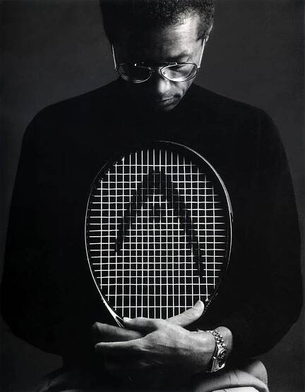 Arthur Ashe Holding Racket Wallpaper