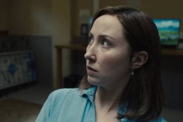 Erin Doherty looking nervously up at someone or something off camera in 'Adolescence' Episode 3