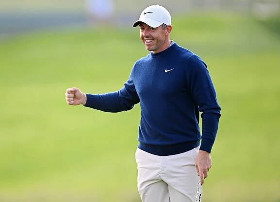 Rory McIlroy pumps his fist on the 11th green during his U.S. Open practice round on June 10.
