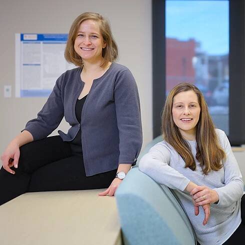 Anne-Sophie Brazeau and Daiva Nielsen sitting together