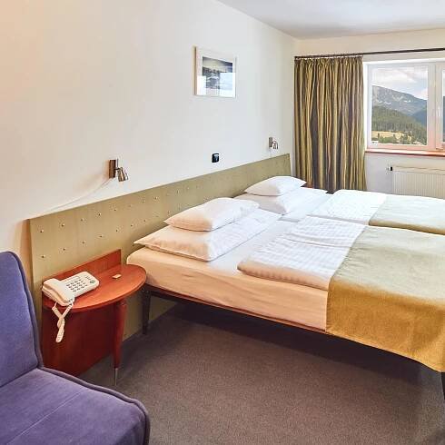 Dvoulůžkový pokoj s přistýlkami - Hotel Horizont Pec pod Sněžkou - Hotel Horizont Pec pod Sněžkou