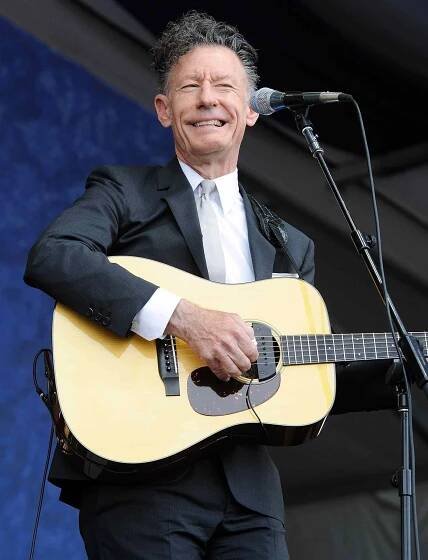 Lyle Lovett performs during the 2014 New Orleans Jazz & Heritage Festival at Fair Grounds Race Course on May 1, 2014 in New Orleans, Louisiana.