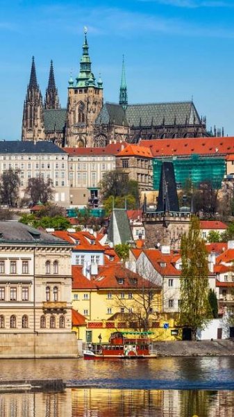 🏰 Prague’s Fairytale Skyline: Castle & Cathedral Reflections! 🌊✨ in 2025 | Travel photography, Family vacations for adults, Prague