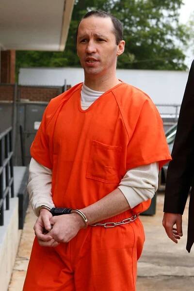 James Everett Dutschke is lead into the Federal Building for a sentencing hearing on May 13, 2014 in Adberdeen, Mississippi.