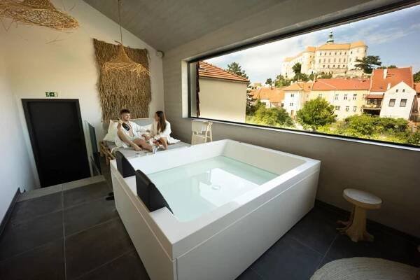 Postel nebo postele na pokoji v ubytování Wellness Hotel Volarik