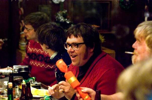 PIRATE RADIO, (aka THE BOAT THAT ROCKED), Nick Frost (right, in red), Philip Seymour Hoffman (right), 2009. Ph: Alex Bailey/©Focus Features