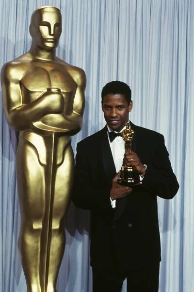 Denzel Washington with the Best Supporting Actor Oscar for "Glory" in 1990