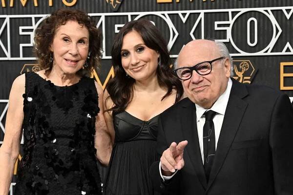 actors Rhea Perlman, Lucy DeVito, and Danny DeVito arrive for the 75th Emmy Awards at the Peacock Theatre at L.A. Live in Los Angeles on January 15, 2024