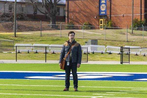 Brian Jordan Alvarez standing on a football field