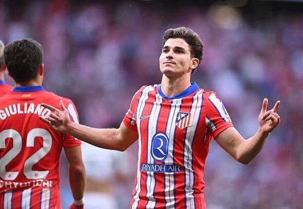 Julian Alvarez of Atletico de Madrid celebrating a goal.