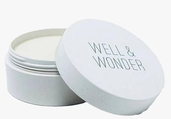 Well  Wonder Body Balm white jar on light gray background